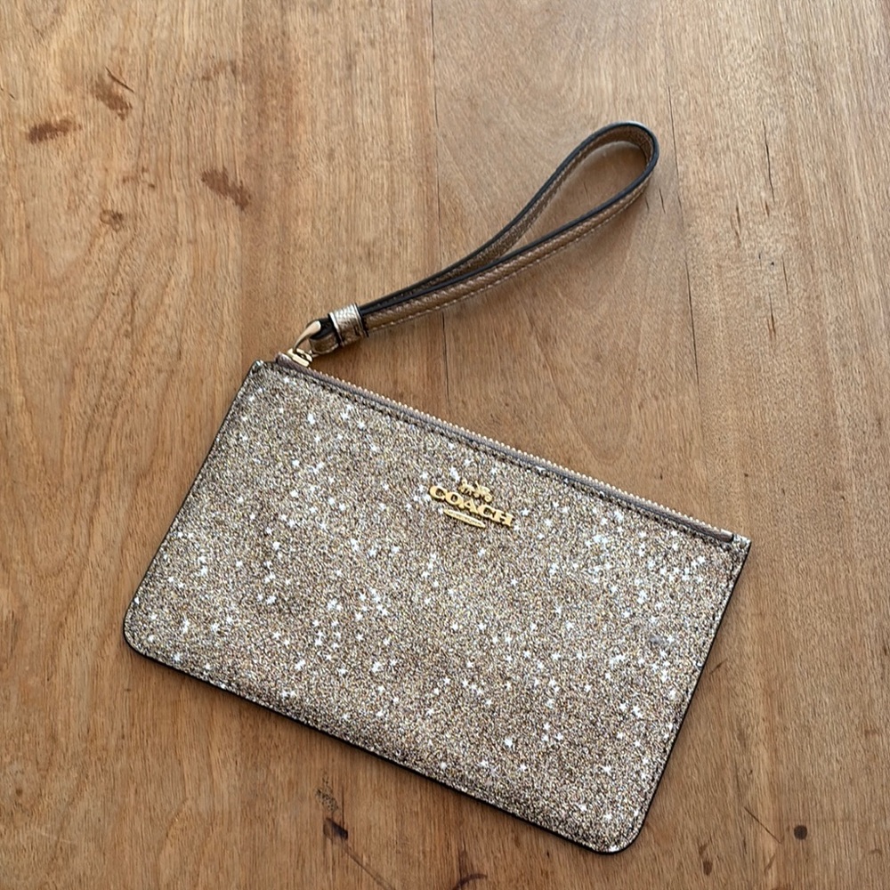 Gold glitter coach wristlet